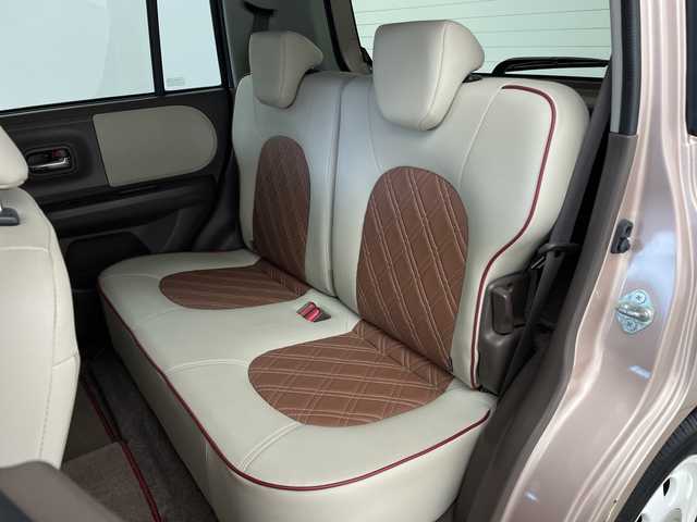 スズキ ラパン ショコラ X 鹿児島県 2014(平26)年 6.5万km シャンパンピンクPM 純正ナビ/(BT/AM/FM/ワンセグTV)/前方ドライブレコーダー/バックカメラ/レザーシート/アイドリングストップ/革巻きステアリング/ウィンカーミラー/ベンチシート/純正フロアマット/オートライト