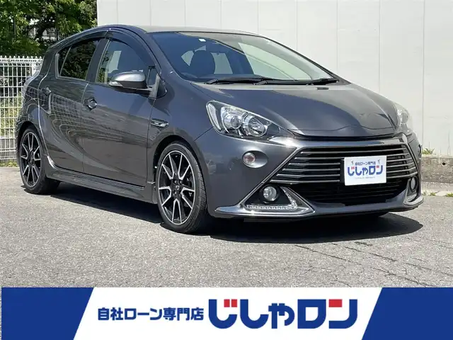 トヨタ アクア G G’s 福島県 2014(平26)年 10.6万km グレーメタリック (株)IDOMが運営する【じしゃロン福島店】の自社ローン専用車両になります。こちらは現金またはオートローンご利用時の価格です。自社ローンご希望の方は別途その旨お申付け下さい/純正SDナビ/フルセグテレビ/ステアリングリモコン/革巻きステアリング/ドアバイザー/バックカメラ/ETC/シートヒーター/LED/ECOモード/フォグライト