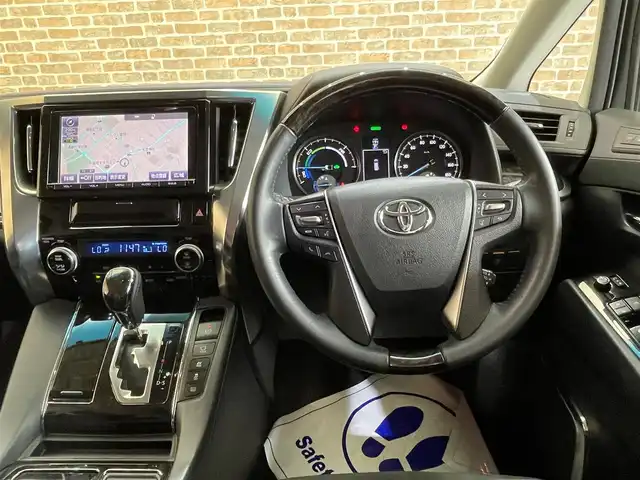 トヨタ ヴェルファイア ハイブリット ZR 岩手県 2015(平27)年 5.5万km ホワイトパールクリスタルシャイン ワンオーナー/４WD/TEIN減衰調整式車高調/両側パワースライドドア/パワーバックドア/クルーズコントロール/クリアランスソナー/横滑り防止装置/MTモード付きAT/オートブレーキホールド/パワーシート/オットマン/リヤオートエアコン/純正９型ナビ/（CD/DVD/フルセグ/SD/Bluetooth）/ステアリングスイッチ/バックカメラ/ETC/LEDヘッドランプ/フォグランプ/純正17インチアルミホイール