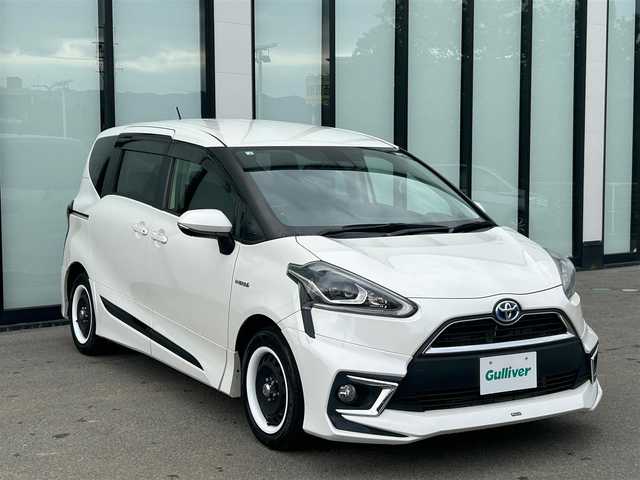 トヨタ シエンタ ハイブリッド G クエロ 大阪府 2018(平30)年 2.4万km ホワイトパールクリスタルシャイン 純正ナビ　/   フルセグTV/CD/DVD/Bluetooth/USB/バックモニター/衝突軽減ブレーキ/横滑り防止装置/モデリスタエアロ/両側パワースライドドア/レーンキープアシスト/ステアリングスイッチ/前後ドライブレコーダー/オートマチックハイビーム/ＤＡＹＴＯＮＡホイール/ハーフレザーシート/純正フロアマット/プッシュスタート/スマートキー/ＥＴＣ/ＬＥＤライト/禁煙車