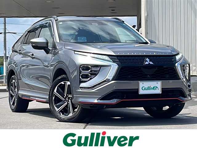 三菱 エクリプス クロス ＰＨＥＶ P 道北・旭川 2020(令2)年 6.1万km チタニウムグレーメタリック ・４ＷＤ/・禁煙車/・純正ナビ/　フルセグ・ＢＴ・ＵＳＢ/・全方位カメラ/・ハーフレザーシート/・前席シートヒーター/・Ｄ席パワーシート/・ラリーアートスタイリンングパッケージ/　フロントアンダーガーニッシュ/　サイドエクステンション/　リヤアンダーガーニッシュ/・スマートキー/・衝突軽減ブレーキ/・車線逸脱警報/・レーダークルーズコントロール/・誤発進抑制機能/・後側方車両検知警報システム/・後退時車両検知警報システム/・ヘッドアップディスプレイ/・１５００Ｗ/・パドルシフト/・LEDオートライト/・オートハイビーム/・ステアリングヒーター/・純正１８インチアルミ/・前後ドライブレコーダー/・ETC/・保証書/・取説