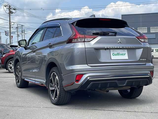 三菱 エクリプス クロス ＰＨＥＶ P 道北・旭川 2020(令2)年 6.1万km チタニウムグレーメタリック ・４ＷＤ/・禁煙車/・純正ナビ/　フルセグ・ＢＴ・ＵＳＢ/・全方位カメラ/・ハーフレザーシート/・前席シートヒーター/・Ｄ席パワーシート/・ラリーアートスタイリンングパッケージ/　フロントアンダーガーニッシュ/　サイドエクステンション/　リヤアンダーガーニッシュ/・スマートキー/・衝突軽減ブレーキ/・車線逸脱警報/・レーダークルーズコントロール/・誤発進抑制機能/・後側方車両検知警報システム/・後退時車両検知警報システム/・ヘッドアップディスプレイ/・１５００Ｗ/・パドルシフト/・LEDオートライト/・オートハイビーム/・ステアリングヒーター/・純正１８インチアルミ/・前後ドライブレコーダー/・ETC/・保証書/・取説