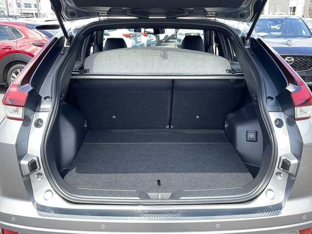 三菱 エクリプス クロス ＰＨＥＶ P 道北・旭川 2020(令2)年 6.1万km チタニウムグレーメタリック ・４ＷＤ/・禁煙車/・純正ナビ/　フルセグ・ＢＴ・ＵＳＢ/・全方位カメラ/・ハーフレザーシート/・前席シートヒーター/・Ｄ席パワーシート/・ラリーアートスタイリンングパッケージ/　フロントアンダーガーニッシュ/　サイドエクステンション/　リヤアンダーガーニッシュ/・スマートキー/・衝突軽減ブレーキ/・車線逸脱警報/・レーダークルーズコントロール/・誤発進抑制機能/・後側方車両検知警報システム/・後退時車両検知警報システム/・ヘッドアップディスプレイ/・１５００Ｗ/・パドルシフト/・LEDオートライト/・オートハイビーム/・ステアリングヒーター/・純正１８インチアルミ/・前後ドライブレコーダー/・ETC/・保証書/・取説