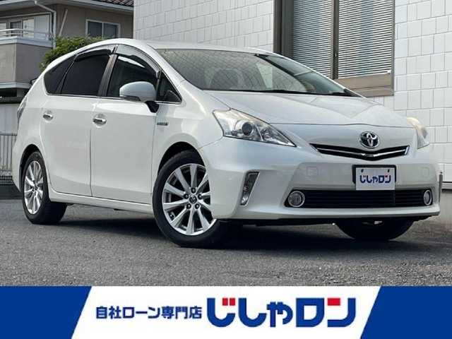 トヨタ プリウス α S 三重県 2013(平25)年 9.9万km ホワイトパールクリスタルシャイン (株)IDOMが運営する【じしゃロン四日市店】の自社ローン専用車両になります。こちらは現金またはオートローンご利用時の価格です。自社ローンご希望の方は別途その旨お申付け下さい/純正メモリナビ/バックカメラ/ETC/ステアリングスイッチ/電動格納ウィンカーミラー/全席シートカバー/オートエアコン/エンジンプッシュスタート/スマートキー
