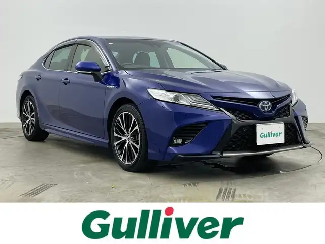 トヨタ カムリ WSレザーパッケージ 岡山県 2019(令1)年 1.7万km ダークブルーマイカM ワンオーナー	/JBLプレミアムサウンドシステム/純正8インチディスプレイオーディオ	/【ナビ/フルセグ/Bluetooth】	/バックカメラ/追従型クルーズコントロール	/オートハイビーム	/LEDヘッドライト（AUTO機能付き）	/ビルトインETC	/前席シートヒーター/前席パワーシート	/運転席パワーシート/パワーバックドア	/衝突軽減ブレーキシステム	/車線逸脱防止システム	/横滑り防止装置	/ブラインドスポットモニター/踏み間違い防止/社外ドライブレコーダー（前後）	/純正18インチアルミ	/コーナーセンサー（前後）	/純正フロアマット	/ステアリングスイッチ/ヘッドアップディスプレイ/シートリフター/ウィンカーミラー/ドアバイザー		/プッシュスタート	/スマートキー×2	/エンジンスターター