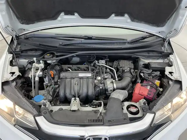 ホンダ フィット 13G F 滋賀県 2017(平29)年 5.9万km タフホワイトⅡ 7型ナビ【CD/DVD/ワンセグ】/バックカメラ/前方ドライブレコーダー/電動格納ミラー/プッシュスタート/スマートキー/ESC/ABS/パワーステアリング/パワーウィンドウ/オートエアコン
