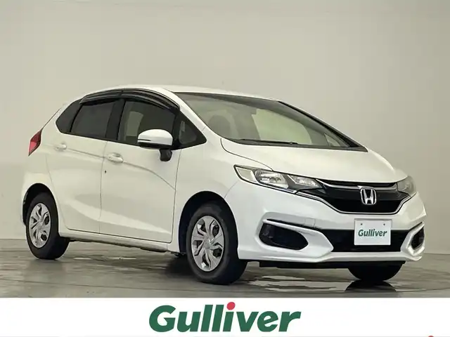 ホンダ フィット 13G F 滋賀県 2017(平29)年 5.9万km タフホワイトⅡ 7型ナビ【CD/DVD/ワンセグ】/バックカメラ/前方ドライブレコーダー/電動格納ミラー/プッシュスタート/スマートキー/ESC/ABS/パワーステアリング/パワーウィンドウ/オートエアコン