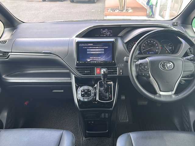 トヨタ エスクァイア Gi 福岡県 2018(平30)年 6.1万km スパークリングブラックパールクリスタルシャイン ・ALPINE9インチナビ/-BT/フルセグTV/CD/DVD/SD/FM/AM/・バックカメラ/・ALPINE10.1インチフリップダウンモニター/・ドラレコ/・ETC/・シートヒーター/・コーナーセンサー/・衝突軽減ブレーキ/・オートライト/・オートハイビーム/・車線逸脱警報/・クルーズコントロール/・アイドリングストップ/・LEDヘッドライト/・両側パワースライドドア/・純正アルミ15インチ/・純正フロアマット