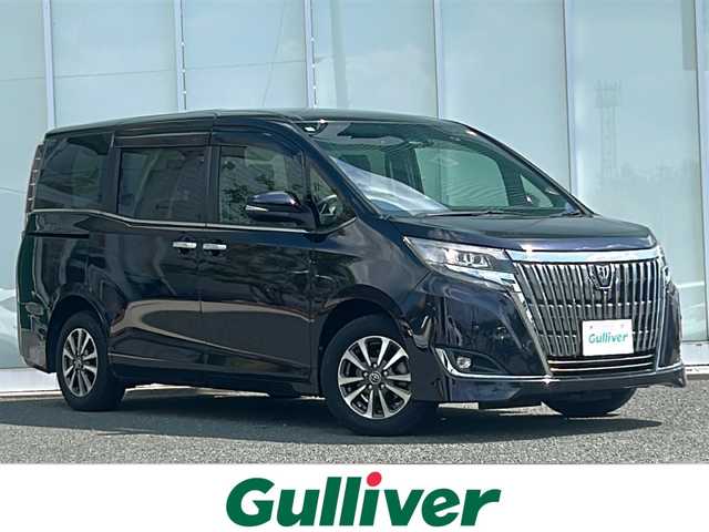 トヨタ エスクァイア Gi 福岡県 2018(平30)年 6.1万km スパークリングブラックパールクリスタルシャイン ・ALPINE9インチナビ/-BT/フルセグTV/CD/DVD/SD/FM/AM/・バックカメラ/・ALPINE10.1インチフリップダウンモニター/・ドラレコ/・ETC/・シートヒーター/・コーナーセンサー/・衝突軽減ブレーキ/・オートライト/・オートハイビーム/・車線逸脱警報/・クルーズコントロール/・アイドリングストップ/・LEDヘッドライト/・両側パワースライドドア/・純正アルミ15インチ/・純正フロアマット