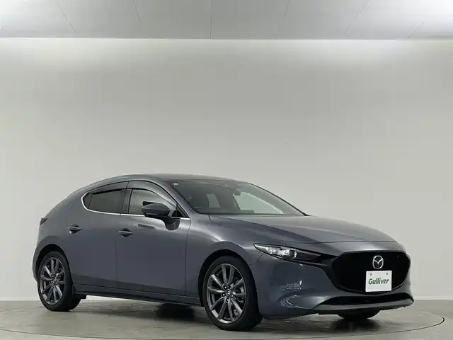 マツダ マツダ３ファストバック 15S ツーリング 埼玉県 2019(令1)年 4万km ポリメタルグレーM 純正ナビ　フルセグＴＶ 全方位カメラ　ＢＳＭ　ＨＵＤ　ＬＥＤヘッドライト　ＥＴＣ　ドライブレコーダー　追従走行　ＭＴモード付ＡＴ　CD/DVD　Bluetooth　オートハイビーム　衝突軽減　純正フロアマット　
