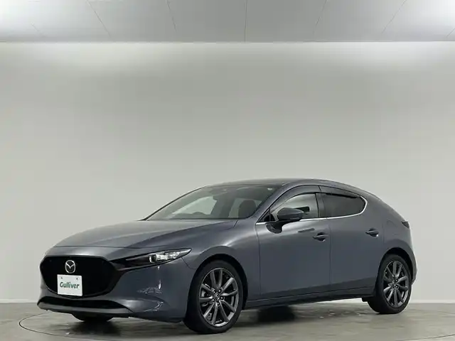 マツダ マツダ３ファストバック 15S ツーリング 埼玉県 2019(令1)年 4万km ポリメタルグレーM 純正ナビ　フルセグＴＶ 全方位カメラ　ＢＳＭ　ＨＵＤ　ＬＥＤヘッドライト　ＥＴＣ　ドライブレコーダー　追従走行　ＭＴモード付ＡＴ　CD/DVD　Bluetooth　オートハイビーム　衝突軽減　純正フロアマット　