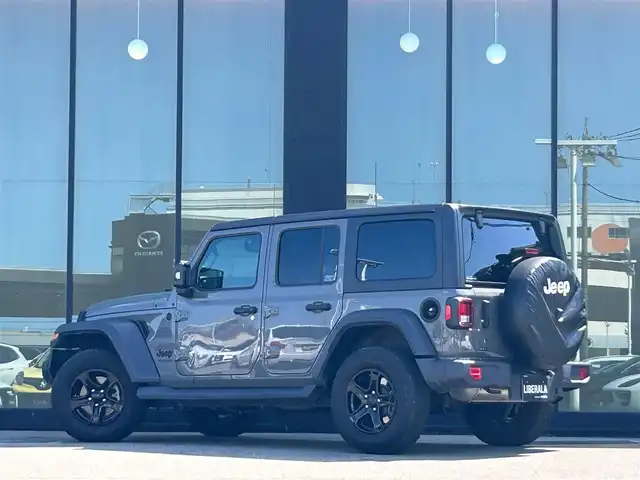 クライスラー・ジープ ジープ ラングラー アンリミテッド スポーツ アルティテュード 石川県 2020(令2)年 4.7万km グレー 4WD/純正ナビディスプレイオーディオナビ/AppleCarPlay/クリアランスソナー/トランスファーレバー/バックカメラ/サイドカメラ/アダプティブクルーズコントロール/ドライブレコーダー/ETC/ABS/横滑り防止装置/盗難防止装置/衝突被害軽減ブレーキ