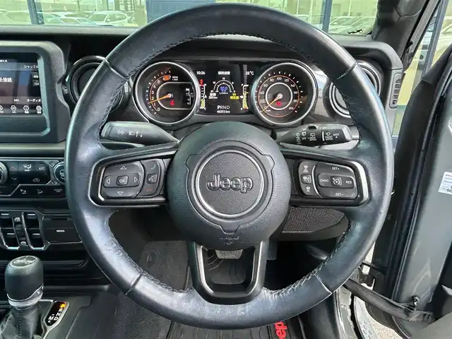 クライスラー・ジープ ジープ ラングラー アンリミテッド スポーツ アルティテュード 石川県 2020(令2)年 4.7万km グレー 4WD/純正ナビディスプレイオーディオナビ/AppleCarPlay/クリアランスソナー/トランスファーレバー/バックカメラ/サイドカメラ/アダプティブクルーズコントロール/ドライブレコーダー/ETC/ABS/横滑り防止装置/盗難防止装置/衝突被害軽減ブレーキ