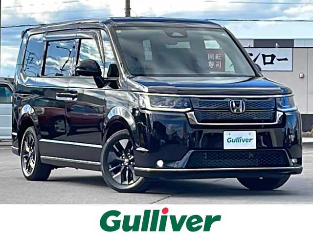 ホンダ ステップワゴン スパーダ 道北・旭川 2024(令6)年 3.3万km クリスタルブラックパール /4WD//禁煙車//寒冷地仕様//ワンオーナー//純正ナビ/CD/DVD/BT/SD/TV//バックカメラ//両側パワースライドドア//電動リアゲート//パドルシフト//ハーフレザー//前席シートヒーター//ミラーヒーター//ビルトインETC//スペアキー//ホンダセンシング/　CMBS/ACC/LKAS/誤発信後方発信抑制/路外逸脱抑制/先行車発信お知らせ/標識認識機能//社外AW冬タイヤ積込//革巻きステアリング//ステアリングリモコン//取扱説明書//保証書