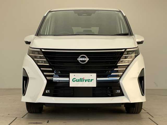 日産 セレナ ハイウェイスター V 愛知県 2024(令6)年 0.9万km プリズムホワイト プロパイロット/9型ナビ/全方位カメラ/両側パワースライドドア/レーダークルーズコントロール/バックカメラ/ハンズフリースライドドア/コーナーセンサー/純正アルミホイール/ＥＴＣ/ブラインドスポットモニター/LEDヘッドライト/パドルシフト/インテリジェントミラー/リアオートエアコン/オートマチックハイビーム/ドライブレコーダー/衝突軽減システム/フルセグ/CD DVD/Bluetooth/ステアリングスイッチ/スマートキー/プッシュスタート