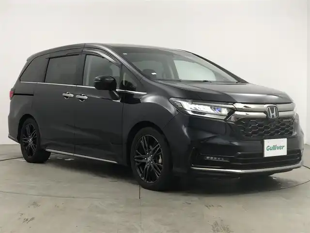 ホンダ オデッセイ ハイブリッド e:HEVアブソルート EX 愛知県 2021(令3)年 2.1万km プレミアムヴィーナスブラックP 10インチ純正ナビ/フリップダウンモニター　/アラウンドビューモニター　/衝突軽減ブレーキ　/ＨＤＭＩ/USB/レーダークルーズコントロール/ジェスチャーコントロール/BSM/電子パーキング　/オートホールド　/ハーフレザー　/パワーシート　/ビルトインＥＴＣ　/ドライブレコーダー/パワースライドドア/アルミホイール/LEDライト/オートハイビーム
