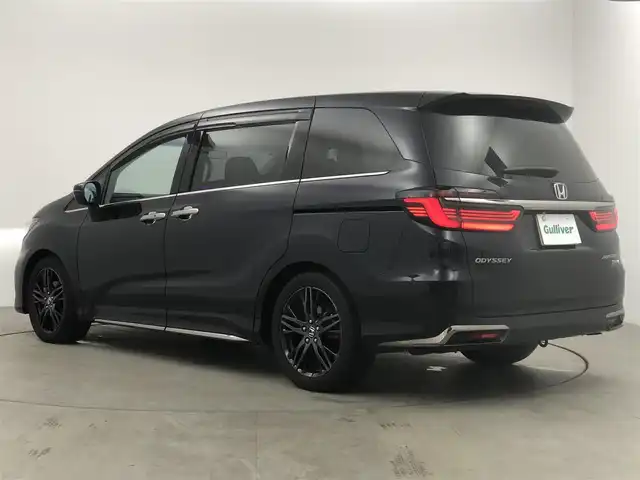 ホンダ オデッセイ ハイブリッド e:HEVアブソルート EX 愛知県 2021(令3)年 2.1万km プレミアムヴィーナスブラックP 10インチ純正ナビ/フリップダウンモニター　/アラウンドビューモニター　/衝突軽減ブレーキ　/ＨＤＭＩ/USB/レーダークルーズコントロール/ジェスチャーコントロール/BSM/電子パーキング　/オートホールド　/ハーフレザー　/パワーシート　/ビルトインＥＴＣ　/ドライブレコーダー/パワースライドドア/アルミホイール/LEDライト/オートハイビーム