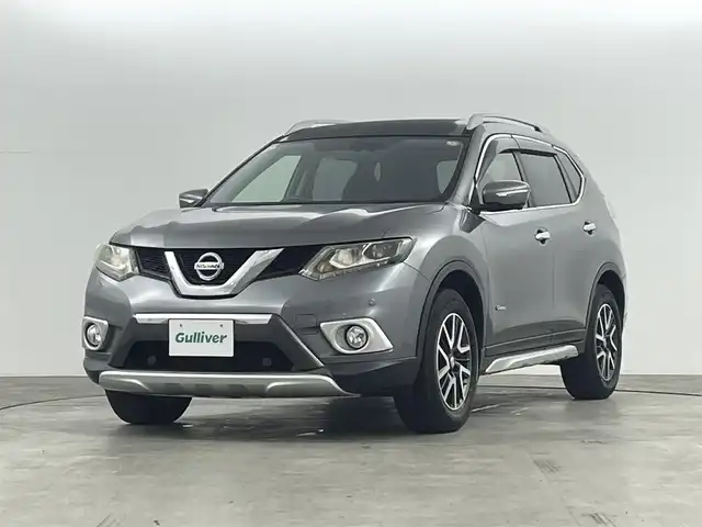 日産 エクストレイル ハイブリッド 20X エクストリーマーXエマージェンシーブレーキ 福島県 2015(平27)年 4.5万km ダークメタルグレー クルーズコントロール/ニッサンインテリジェントモビリティ/エマージェンシーブレーキ/インテリジェントパーキングアシスト/レーンキープアシスト/衝突軽減ブレーキ/BSM/ハイビームアシスト/コーナーセンサー前後/純正7インチSDナビゲーション/・型式：QY-7391PC/・TV/Bluetooth/USB/AUX/CD/DVD/AM・FM/・ETC/・アラウンドビューモニター/・バックカメラ/LEDヘッドライト/・フォグランプ/・オートライト/電動格納ウインカーミラー/革巻きステアリング/・ステアリングスイッチ/レザーシート/前席シートヒーター/前席エアシート/プッシュスタート/・スマートキー/４WD/ルーフレール/純正フロアマット