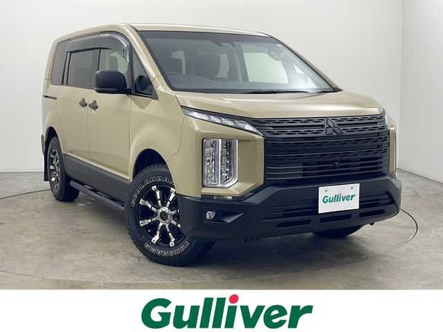 三菱 デリカＤ：５ M 秋田県 2021(令3)年 4.9万km ベージュ 4WD/衝突被害軽減ブレーキ/社外メモリナビ　/　　CD/DVD/BT/フルセグTV/バックカメラ　/片側パワースライドドア　/レーダークルーズコントロール　/LEDオートライト　/社外16インチアルミホイール　/パドルシフト　/オートハイビーム　/サイドステップ/USB入力端子/パドルシフト/スマートキー　/ビルトインETC