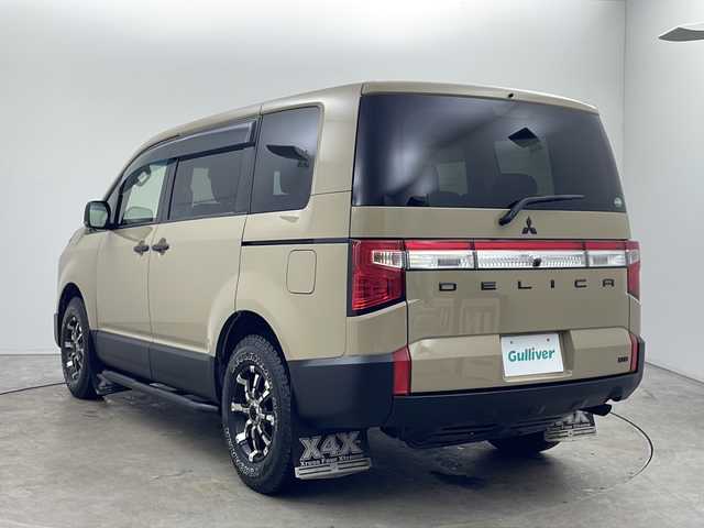 三菱 デリカＤ：５ M 秋田県 2021(令3)年 4.9万km ベージュ 4WD/衝突被害軽減ブレーキ/社外メモリナビ　/　　CD/DVD/BT/フルセグTV/バックカメラ　/片側パワースライドドア　/レーダークルーズコントロール　/LEDオートライト　/社外16インチアルミホイール　/パドルシフト　/オートハイビーム　/サイドステップ/USB入力端子/パドルシフト/スマートキー　/ビルトインETC