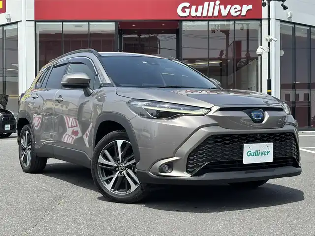 トヨタ カローラ クロス ハイブリッド Z 宮城県 2023(令5)年 1.6万km アバンギャルドブロンズメタリック 走行距離：１５５０７ｋｍ/１００V充電/地デジ・ＢＴ・ＡＭ・ＦＭ/ＥＴＣ２．０/追従クルーズコントロール/電動リアゲート/アラウンドビュー/デュアルエアコン/レベライザー/純正フロアマット/前後ドライブレコーダー/前後コーナーセンサー/D＋N席シートヒーター/ウィンカーミラー/純正アルミホイール/革巻きステアリング/フォグランプ/全席オートウィンドー/電格ミラー/D席パワーシート/ルーフレール/トヨタセーフティーセンスDVDナビ