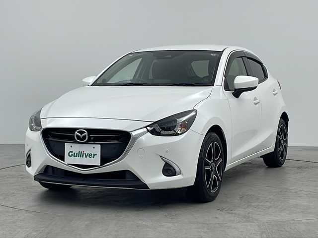 マツダ デミオ 15Sツーリング 三重県 2018(平30)年 5.8万km スノーフレイクホワイトパールマイカ 禁煙車/メーカーＯＰSDナビ/・Bluetooth・フルセグ・CD/DVD・SD・AUX・USB/３６０°ビューモニター/衝突被害軽減ブレーキ/車線逸脱警報システム/パーキングセンサー/ＢＳＭ/オートライト/オートマチックハイビーム/HUD/パドルシフト/前席シートヒーター/ビルドインＥＴＣ