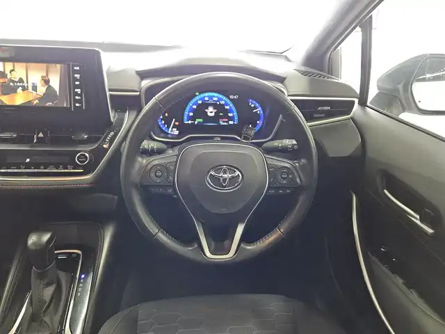 トヨタ カローラ スポーツ ハイブリッドG Z 香川県 2019(令1)年 5.3万km ホワイトパールクリスタルシャイン 〇純正ナビ/〇フルセグTV/〇セーフティセンス/・プリクラッシュセーフティシステム/・レーントレーシングアシスト/・レーダークルーズコントロール/・オートマチックハイビーム/・ロードサインアシスト/〇ドライブモードセレクト/〇LEDヘッドランプ	/〇オートライト	/〇LEDフロントフォグランプ	/〇純正18インチアルミ	/〇革巻きステアリング	/〇左右独立温度調整オートエアコン/〇レッドステッチ入ブラックファブリックシート/〇スポーツシート（前席）/〇ビルトインETC/〇ドライブレコーダー/〇スマートエントリー
