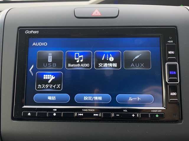 ホンダ フリード＋ ハイブリット G 佐賀県 2023(令5)年 0.7万km プラチナホワイトパール 外部検査実施済み/登録時走行距離6683km/ワンオーナー/純正メモリナビ【VXM-234VFi】/(DVD/フルセグTV/Bluetooth/USB/MSV)/バックカメラ/レーダークルーズコントロール/両側パワースライドドア/ホンダセンシング/・CMBS（衝突軽減ブレーキ）/・歩行者事故低減ステアリング/・アダクティブクルーズコントロール/・LKAS（車線維持支援システム）/・路外逸脱抑制機能/・誤発進抑制機能（前方/後方）/・先行車発進お知らせ機能/・標識認識機能/LEDヘッドライト/スマートキー/ビルトインETC/前後ドライブレコーダー/純正15インチアルミホイール/横滑り防止機能/純正ホイール付きスタッドレスタイヤ積込/保証書/取扱説明書/スペアキー