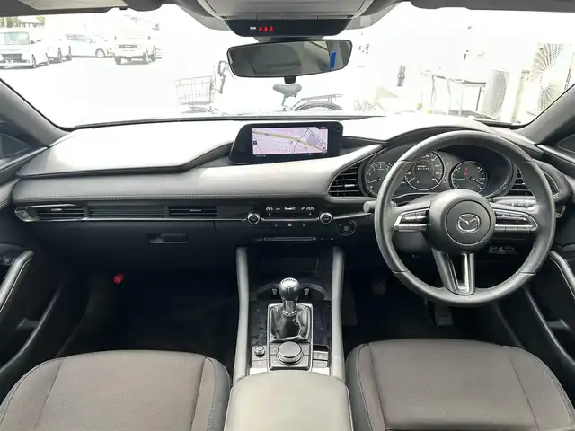 マツダ マツダ３ファストバック 15S ツーリング 群馬県 2020(令2)年 1.4万km ポリメタルグレーM 6MT車/8.8インチワイドマツダコネクトナビ/（CD/DVD/SD/USB/MSV/HDMI）/フルセグテレビ/バックカメラ/360度ビューモニター/ドライバーモニタリング/パーキングセンサー/クルーズコントロール/スマートブレーキサポート/車線逸脱警報システム/レーンキープアシスト/後側方接近車両検知/ブレインドスポットモニタリング/LEDヘッドランプ/純正18インチアルミホイール/アドバンスドキーレスエントリーシステム/純正フロアマット/保証書/取扱説明書/スペアキー