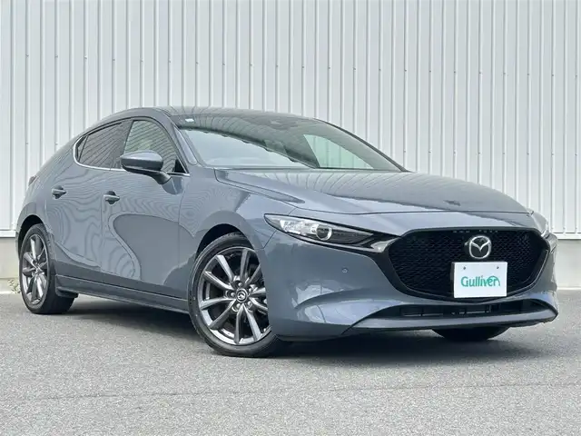 マツダ マツダ３ファストバック 15S ツーリング 群馬県 2020(令2)年 1.4万km ポリメタルグレーM 6MT車/8.8インチワイドマツダコネクトナビ/（CD/DVD/SD/USB/MSV/HDMI）/フルセグテレビ/バックカメラ/360度ビューモニター/ドライバーモニタリング/パーキングセンサー/クルーズコントロール/スマートブレーキサポート/車線逸脱警報システム/レーンキープアシスト/後側方接近車両検知/ブレインドスポットモニタリング/LEDヘッドランプ/純正18インチアルミホイール/アドバンスドキーレスエントリーシステム/純正フロアマット/保証書/取扱説明書/スペアキー