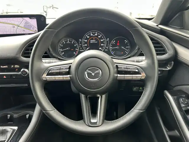 マツダ マツダ３ファストバック 15S ツーリング 群馬県 2020(令2)年 1.4万km ポリメタルグレーM 6MT車/8.8インチワイドマツダコネクトナビ/（CD/DVD/SD/USB/MSV/HDMI）/フルセグテレビ/バックカメラ/360度ビューモニター/ドライバーモニタリング/パーキングセンサー/クルーズコントロール/スマートブレーキサポート/車線逸脱警報システム/レーンキープアシスト/後側方接近車両検知/ブレインドスポットモニタリング/LEDヘッドランプ/純正18インチアルミホイール/アドバンスドキーレスエントリーシステム/純正フロアマット/保証書/取扱説明書/スペアキー