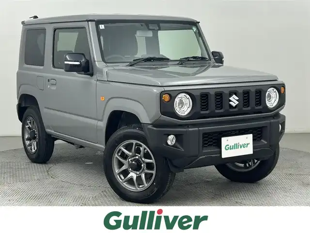 スズキ ジムニー XC 道央・札幌 2025(令7)年 0.1万km未満 ミディアムグレー ・4WD/・社外メモリナビ/・フルセグTV/BT/CD/DVD/・バックカメラ/・ETC/・デュアルセンサーブレーキサポート/・レーンキープアシスト/・クルーズコントロール/・オートハイビーム/・シートヒーター/・アイドリングストップ/・ダウンヒルアシスト/・コーナーセンサー/・ステアリングスイッチ/・純正16インチAW/・プッシュスタート/・スマートキー/・スペアキー/・社外フロアマット/・取扱説明書