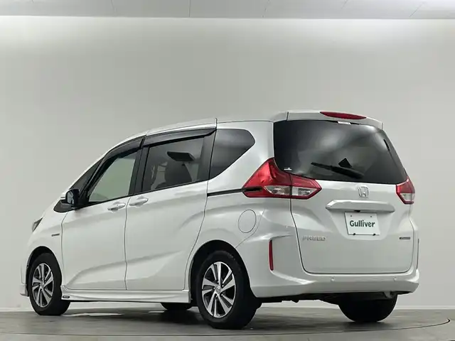 ホンダ フリード ハイブリット G ホンダセンシング 埼玉県 2021(令3)年 2.9万km プラチナホワイトパール 禁煙車　純正９型ナビ　シートヒーター　両側電動パワースライドドア　バックカメラ　　ドライブレコーダー　ＥＴＣ２．０　レーダークルーズコントロール　フルセグＴＶ　寒冷地仕様　ＬＥＤヘッドライト　１００Ｖ電源