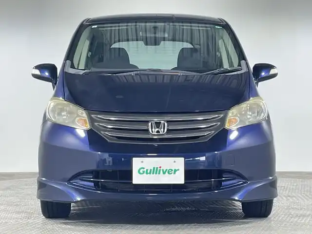 ホンダ フリード Gエアロ Lパッケージ 神奈川県 2009(平21)年 6.8万km プレミアムナイトブルーパール 純正７型HDDナビゲーション【９NHC】/純正フリップダウンモニター/フルセグ　AM FM /バックカメラ/片側電動スライドドア【イージークローザー】/ステアリングスイッチ/社外ETC/純正サイド/リアスポイラー/純正16インチアルミホイール/HIDヘッドライト/オートライト