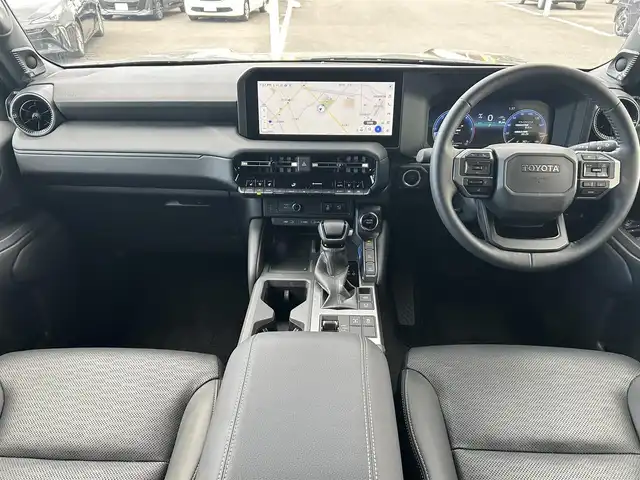 トヨタ ランドクルーザー ２５０ VX 栃木県 2024(令6)年 0.3万km ブラック ワンオーナー/ムーンルーフ/トヨタセーフティセンス/ディスプレイオーディオプラス/フルセグTV/Bluetooth/USB/HDMI/MiraCast/JBLプレミアムサウンドシステム/床下透過表示機能付パノラミックビューモニター/周辺車両接近時サポート付ブラインドスポットモニター/デジタルインナーミラー/ETC2.0/黒革シート/パワーシート/シートヒーター/エアシート/パワーバックドア/パーキングサポートブレーキ/クリアランスソナー/レーダークルーズコントロール/LEDヘッドライト/フロント/リアフォグ/ステアリングヒーター/リモコン/nanoeX左右後席独立オートエアコン/保証書/取説