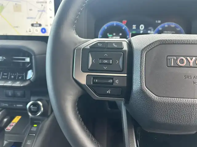 トヨタ ランドクルーザー ２５０ VX 栃木県 2024(令6)年 0.3万km ブラック ワンオーナー/ムーンルーフ/トヨタセーフティセンス/ディスプレイオーディオプラス/フルセグTV/Bluetooth/USB/HDMI/MiraCast/JBLプレミアムサウンドシステム/床下透過表示機能付パノラミックビューモニター/周辺車両接近時サポート付ブラインドスポットモニター/デジタルインナーミラー/ETC2.0/黒革シート/パワーシート/シートヒーター/エアシート/パワーバックドア/パーキングサポートブレーキ/クリアランスソナー/レーダークルーズコントロール/LEDヘッドライト/フロント/リアフォグ/ステアリングヒーター/リモコン/nanoeX左右後席独立オートエアコン/保証書/取説