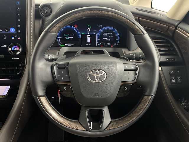 トヨタ アルファードハイブリット エグゼクティブ ラウンジ 埼玉県 2025(令7)年 1万km ブラック 純正14インチディスプレイオーディオ/　(Bluetooth/Miracast/USB/FM/AM)/フルセグテレビ/純正フリップダウンモニター/全方位カメラ/ビルトインETC/ドライブレコーダー/両側パワースライドドア/デジタルインナーミラー/パワーバックドア/ガラスルーフ/JBLサウンドシステム/ブラインドスポットモニター/レーダークルーズコントロール/衝突被害軽減ブレーキ/車線逸脱警報/クリアランスソナー/レザーシート/シートヒーター/パワーシート/エアーシート/シートメモリー/ステアリングヒーター/パーキングアシスト/パドルシフト/ワイヤレス充電/オートハイビーム/オートLEDライト/電子パーキングシステム/ブレーキホールド/純正フロアマット/純正19インチアルミホイール