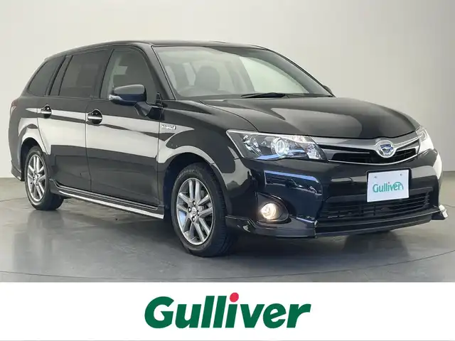 トヨタ カローラ フィールダー HV G エアロツアラー W×B 愛知県 2014(平26)年 7.9万km ブラックマイカ 純正ＳＤナビ　フルセグＴＶ　ＥＴＣ　ＤＶＤ　Ｂｌｕｅｔｏｏｔｈ　バックカメラ　ハーフレザーシート　オートライト　フォグランプ　ナノイーエアコン　純正フロアマット　ドアバイザー　純正１５インチＡＷ　禁煙