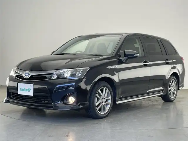 トヨタ カローラ フィールダー HV G エアロツアラー W×B 愛知県 2014(平26)年 7.9万km ブラックマイカ 純正ＳＤナビ　フルセグＴＶ　ＥＴＣ　ＤＶＤ　Ｂｌｕｅｔｏｏｔｈ　バックカメラ　ハーフレザーシート　オートライト　フォグランプ　ナノイーエアコン　純正フロアマット　ドアバイザー　純正１５インチＡＷ　禁煙