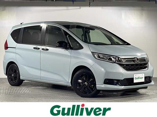 ホンダ フリード G ブラックスタイル 沖縄県 2022(令4)年 2.6万km フィヨルドミストパール 県外仕入/禁煙車　/6人乗り/社外ディスプレイオーディオ（FH850DVS）/CD/BT/AppleCarPlay/USB/ラジオ/バックカメラ/両側パワースライドドア/ビルトインETC/前後ドライブレコーダー/ホンダセンシング/衝突軽減ブレーキ/レーンキープアシスト/アダプティブクルーズコントロール/横滑り防止装置/LEDヘッドライト/オートライト/純正15インチAW/プッシュスタート/スマートキー/スペアキー