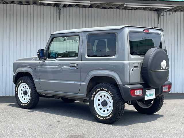 スズキ ジムニー XC 長野県 2022(令4)年 0.5万km ミディアムグレー ４WD/スズキセーフティサポート/純正メモリナビフルセグTV/ドライブレコーダー/ETC/シートヒーター/純正16インチアルミ/社外マフラー/ワンオーナー/保証書・取説/スペアキー