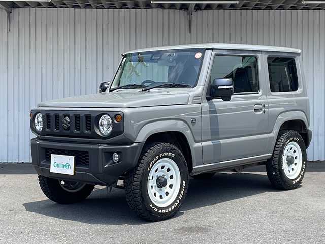 スズキ ジムニー XC 長野県 2022(令4)年 0.5万km ミディアムグレー ４WD/スズキセーフティサポート/純正メモリナビフルセグTV/ドライブレコーダー/ETC/シートヒーター/純正16インチアルミ/社外マフラー/ワンオーナー/保証書・取説/スペアキー