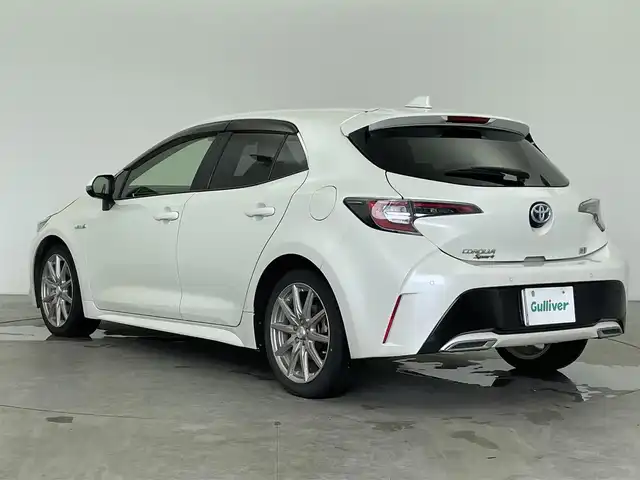 トヨタ カローラ スポーツ ハイブリッドG Z 富山県 2020(令2)年 4.9万km ホワイトパールクリスタルシャイン 純正9型ディスプレイオーディオ/（AM/FM/BT/USB/フルセグ）/バックカメラ/ドライブレコーダー/ETC/衝突被害軽減システム/レーダークルーズコントロール/レーンキープアシスト/コーナーセンサー/横滑り防止装置/アイドリングストップ/オートLEDライト/オートマチックハイビーム/フォグライト/純正フロアマット/社外アルミホイール/革巻きステアリング/ステアリングスイッチ/純正ホイール付夏タイヤ有/スマートキー/スペアキー/純正エンジンスターター有