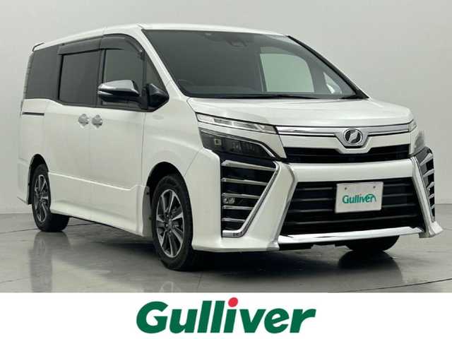 トヨタ ヴォクシー ZS 煌 熊本県 2019(平31)年 6.9万km ホワイトパールクリスタルシャイン アルパインナビEX11Z（ＣＤ・ＤＶＤ・フルセグ・ＢＴ）/アルパインフリップダウンモニター/バックカメラ　/ビルトインＥＴＣ　/両側パワースライドドア　/クルーズコントロール　/プリクラッシュブレーキ　/レーンデェパーチャアラート　/アイドリングストップ/横滑り防止/社外フロアマット/純正16インチAW/オートライト/オートマチックハイビーム/LEDヘッドライト/フォグライト/スマートキー/プッシュスタート