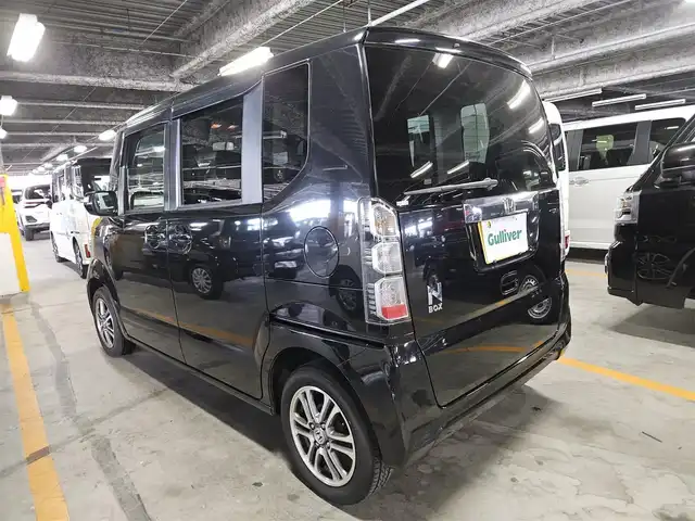 ホンダ Ｎ ＢＯＸ G ターボ Lパッケージ 長崎県 2014(平26)年 6.5万km スマートブラック ワンオーナー/純正ナビ/ワンセグTV/両側パワースライドドア/バックカメラ/ビルトインETC/ドライブレコーダー/クルーズコントロール/ターボ/純正オプHIDヘッドランプ/オートライト/革巻きステアリング/ステアリングスイッチ/パドルシフト/後席チップアップシート/純正14インチアルミホイール/スマートキー/プッシュエンジンスタート/禁煙車