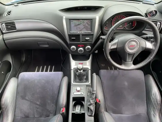 スバル インプレッサ ＷＲＸ STi 石川県 2010(平22)年 11.9万km WRブルーマイカ 登録時118269Km/ナビ/（AM・FM・HDDmusic・CD・DVD）/スペアキー　/バックカメラ　/パワステ　/横すべり防止　/ＨＩＤライト　/フォグライト　/電動格納ミラー　/純正フロアマット　/ワンセグＴＶ　/プッシュスタート　/ＥＴＣ　/保証書　/取説