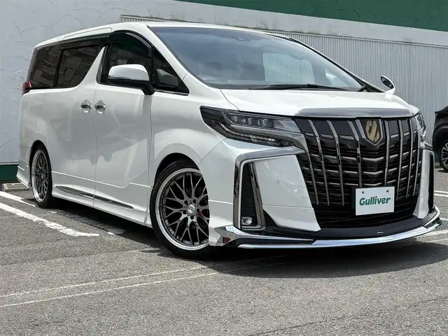トヨタ アルファード S タイプゴールドⅢ 徳島県 2022(令4)年 2.2万km ホワイトパールクリスタルシャイン 純正9インチディスプレイオーディオ/(AM/FM/TV/Bluetooth/USB)/モデリスタフルエアロ/純正フリップダウンモニター/バック・全周囲カメラ/ETC/両側電動パワースライドドア/電動リアゲート/クルーズコントロール/前後コーナーセンサー/レーンキープアシスト/オートライト/ドアバイザー