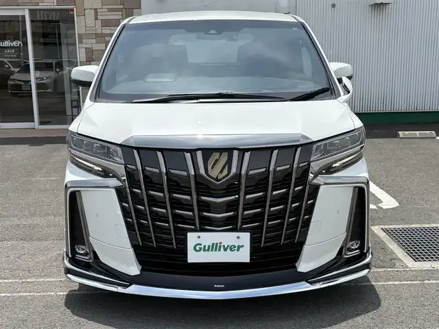 トヨタ アルファード S タイプゴールドⅢ 徳島県 2022(令4)年 2.2万km ホワイトパールクリスタルシャイン 純正9インチディスプレイオーディオ/(AM/FM/TV/Bluetooth/USB)/モデリスタフルエアロ/純正フリップダウンモニター/バック・全周囲カメラ/ETC/両側電動パワースライドドア/電動リアゲート/クルーズコントロール/前後コーナーセンサー/レーンキープアシスト/オートライト/ドアバイザー