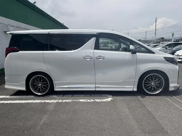 トヨタ アルファード S タイプゴールドⅢ 徳島県 2022(令4)年 2.2万km ホワイトパールクリスタルシャイン 純正9インチディスプレイオーディオ/(AM/FM/TV/Bluetooth/USB)/モデリスタフルエアロ/純正フリップダウンモニター/バック・全周囲カメラ/ETC/両側電動パワースライドドア/電動リアゲート/クルーズコントロール/前後コーナーセンサー/レーンキープアシスト/オートライト/ドアバイザー