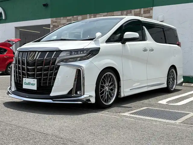 トヨタ アルファード S タイプゴールドⅢ 徳島県 2022(令4)年 2.2万km ホワイトパールクリスタルシャイン 純正9インチディスプレイオーディオ/(AM/FM/TV/Bluetooth/USB)/モデリスタフルエアロ/純正フリップダウンモニター/バック・全周囲カメラ/ETC/両側電動パワースライドドア/電動リアゲート/クルーズコントロール/前後コーナーセンサー/レーンキープアシスト/オートライト/ドアバイザー